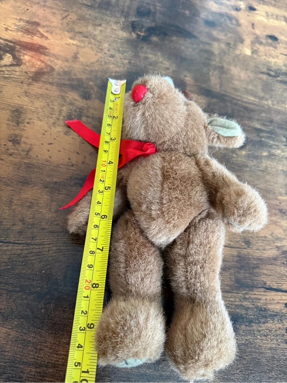 Plush Brown Reindeer Toy with Red Scarf and Santa Hat vintage